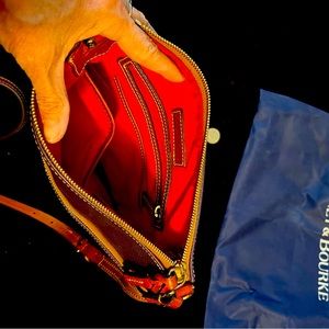 Beautiful Plum Pebble Leather Dooney and Burke crossbody